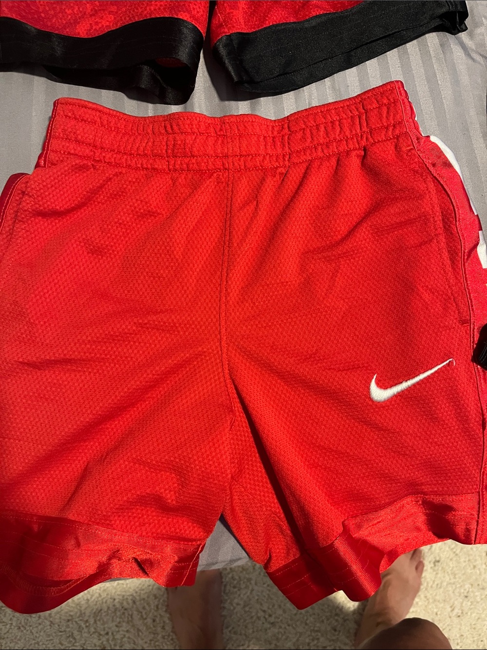 Nike Red Mesh Shorts with White Swoosh